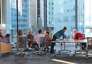 Photo of people at a conference table for Learning Forward Minnesota Website